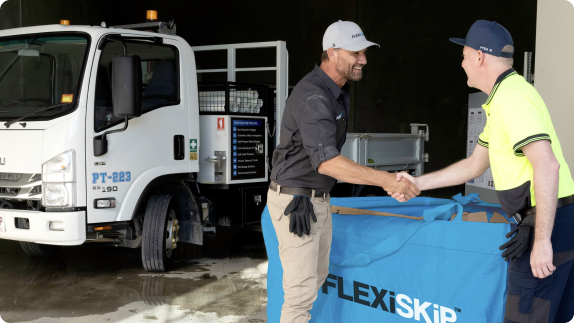 Truck, FlexiSkip, and two people shaking hands